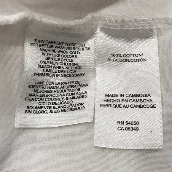 Jones New York Sport White Crew Neck Blouse w/ 3 Buttons on the Sleeve
Ladies - Picture 16 of 16